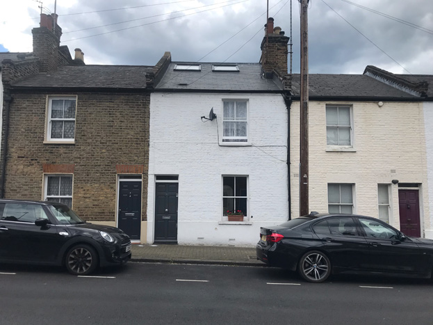 Figs. 43 & 44: Examples of a raised roof ridges in a modern finish which projects the centre terrace above its neighbour despite being lower on sloping road – they should match their partner to the left