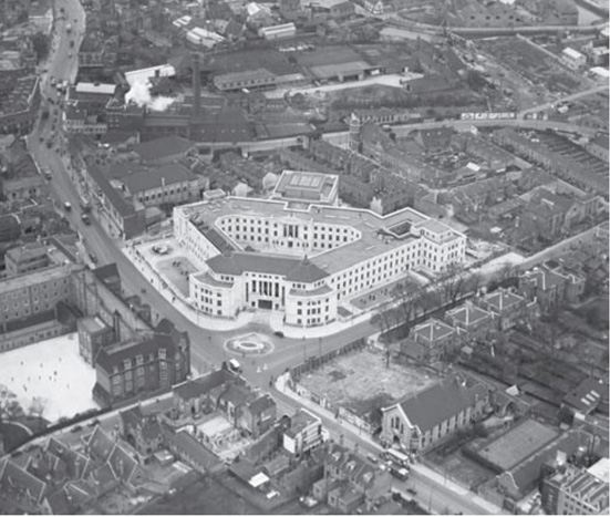Fig. 70: Aerial photograph of the Civic sub-area from the south-east c.1938.   The construction of Armoury Way is evident at top right. © English Heritage