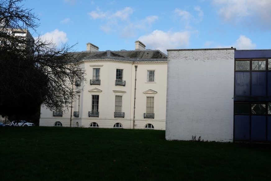 Fig. 84: the rear elevation of Mount Clare, partially obscured by the later student residential blocks.