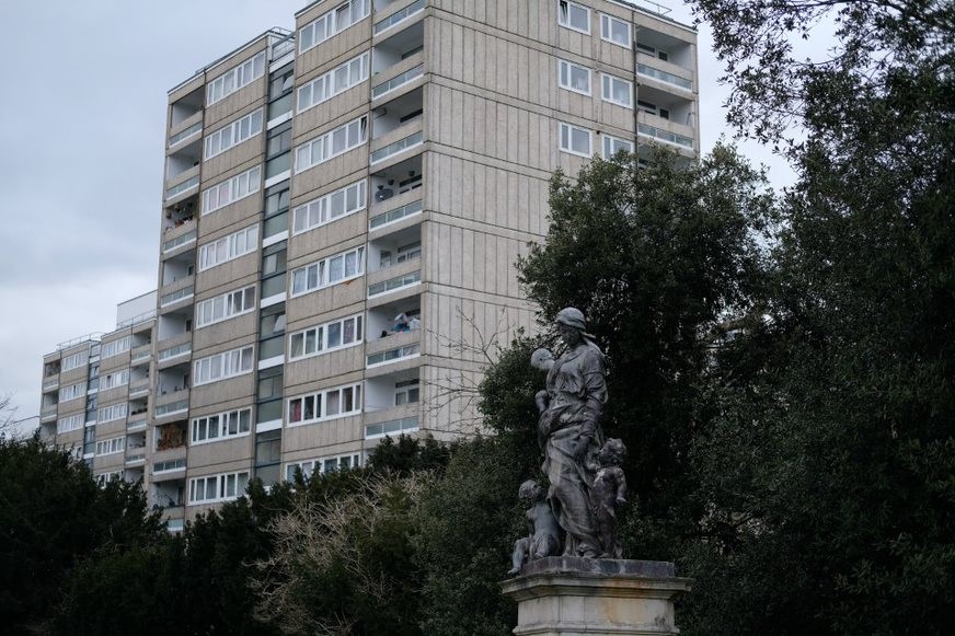 Fig. 85: the statue in front of Mount Clare has a pleasing contrast to the looming point blocks, a reminder of the very different layers of history with aristorcratic and municipal housing