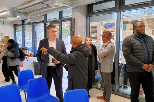 Council Leader Simon Hogg speaking with a resident